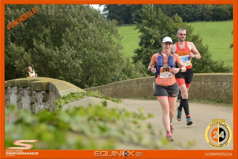 Image of Kat running over a bridge at Equinox24