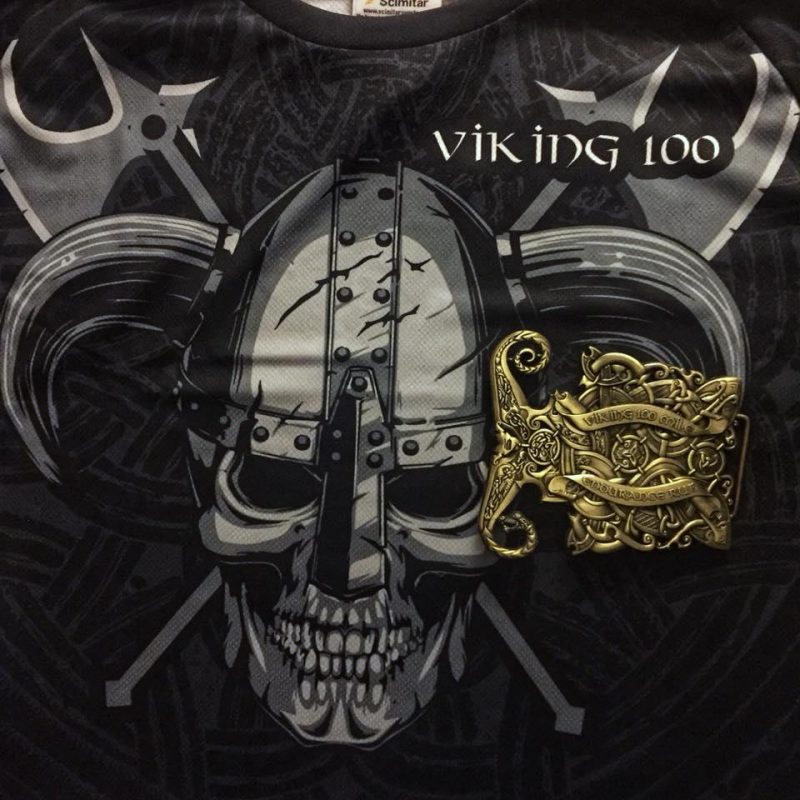 image shows Viking 100 finisher shirt and gold belt buckle