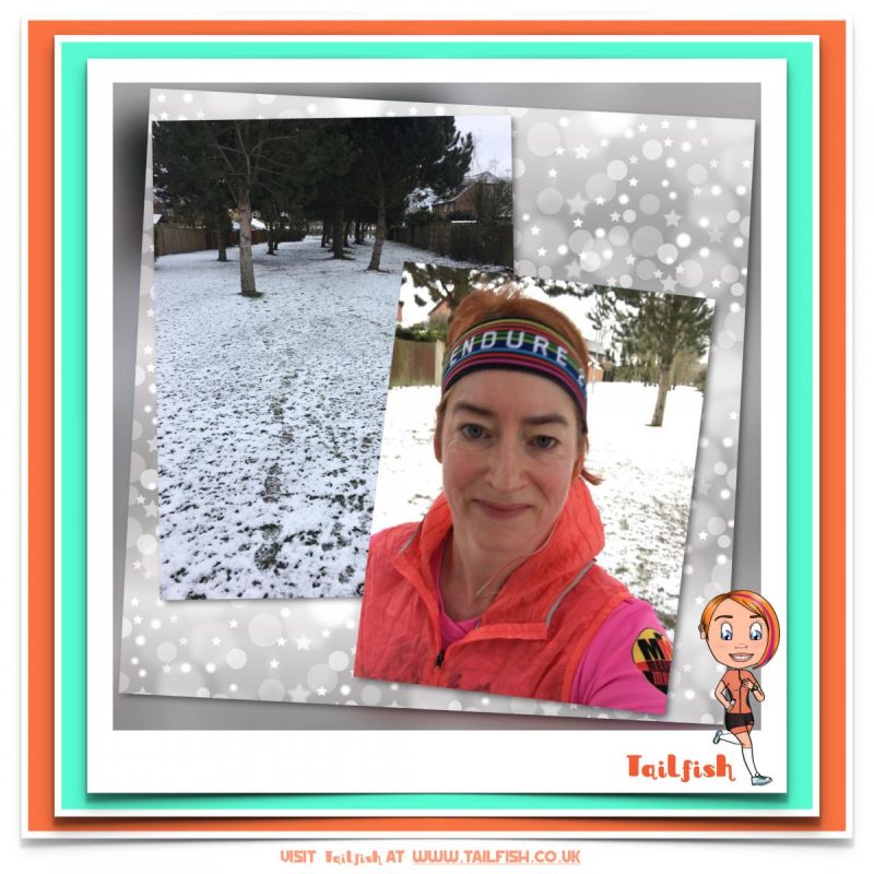 image shows snowy trail and run selfie